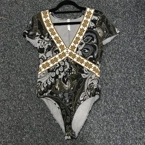 Free people patterned bodysuit.